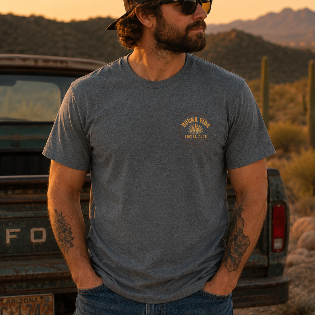 Person wearing the Heather Heavy Metal Buena Vida Social Club Tee with the chest logo visible.
