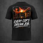 Back view of the black Every Cop's Dream Job Tee featuring firefighters beneath a burning structure. 