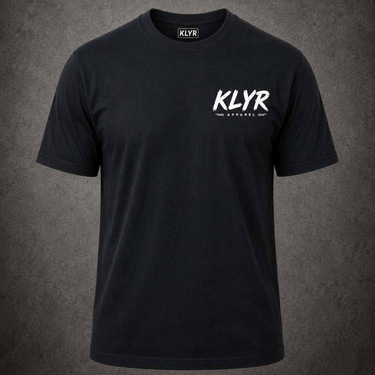 Person wearing the black Every Cop's Dream Job Tee with the white KLYR chest logo visible. 