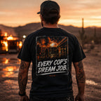 Person wearing the black Every Cop's Dream Job Tee with the structure-fire back graphic visible. 
