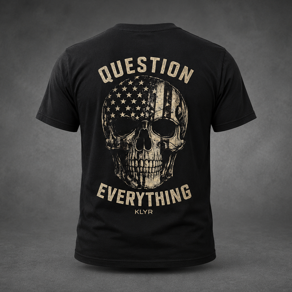 Back view of the black KLYR Independent Tee featuring a distressed American flag skull and Question Everything graphic.